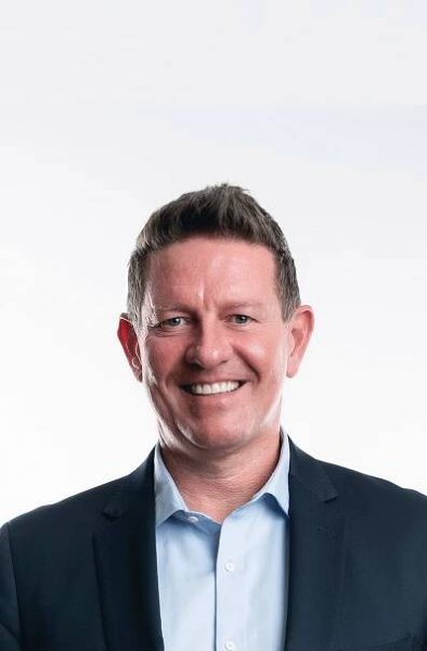 professional headshot of man andrew clarke against white background