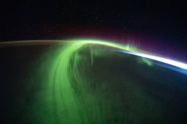 Sedmdesátiletý astronaut pořídil z vesmíru skvělé fotky polární záře