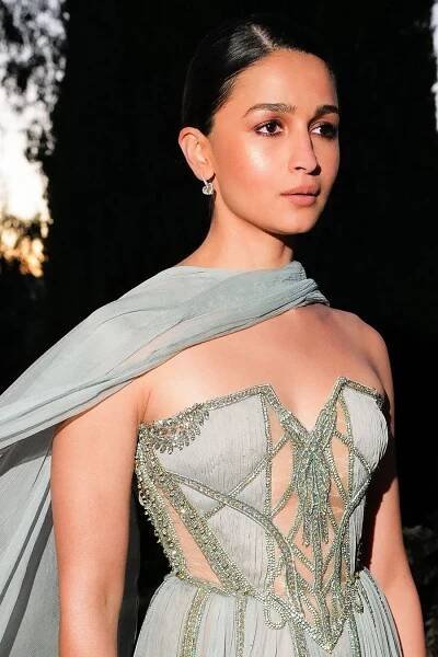 Image may contain Black Hair Hair Person Clothing Dress Head Face Adult Evening Dress Formal Wear and Photography Alia Bhatt