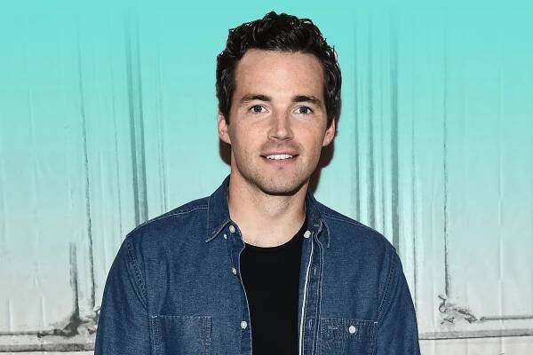 Image may contain Ian Harding Human Person Man Clothing Apparel and Pants