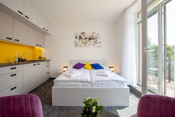 Postel nebo postele na pokoji v ubytování Apartmány Nikola