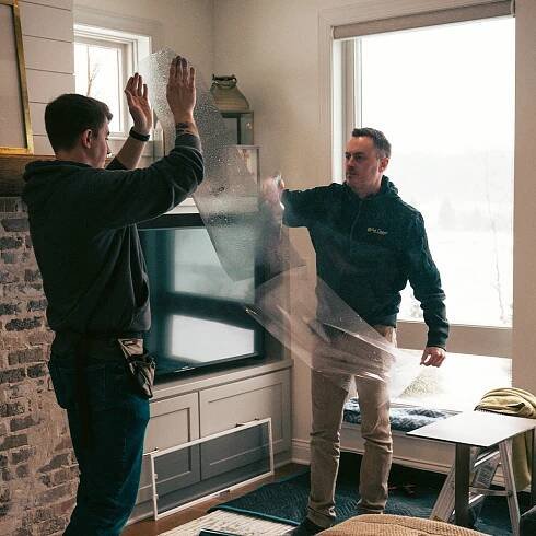 Todd Jensen and Zack Installing Window Film