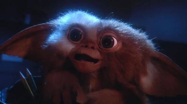 Gizmo during santa Claus speech in Gremlins