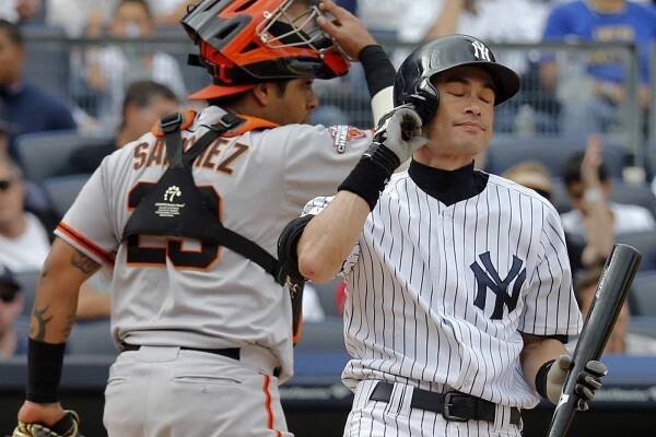 Yankees outfielder Ichiro Suzuki reacts after striking out in the seventh inning against the Giants.