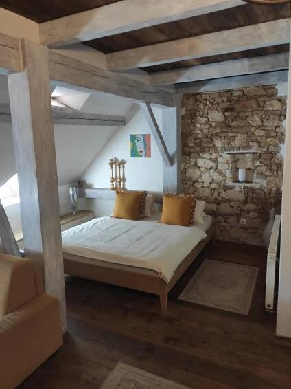 Postel nebo postele na pokoji v ubytování Apartmany Antico