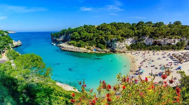 Exotic bay resort in Cala Llombards beach, Mallorca island of Spain. Summer holiday in a paradise place