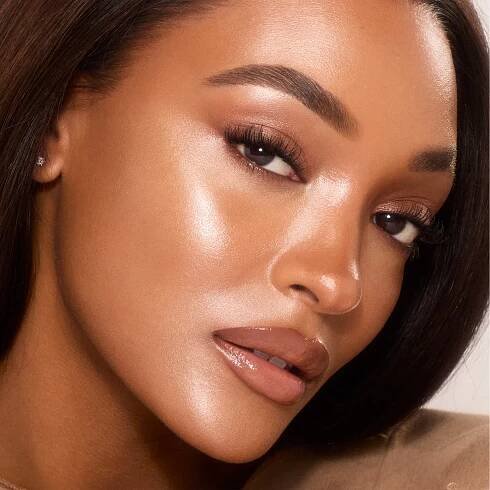 UNREAL SKIN SHEER GLOW TINT - 10 TAN