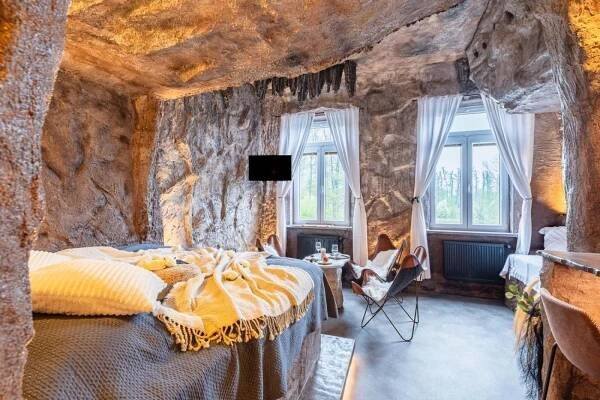 Postel nebo postele na pokoji v ubytování Apartmány v Podzámčí v blízkosti zámku Blatná