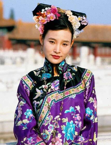 Portrait of Chinese actress Joan Chen as she poses, in costume for the film 'The Last Emperor' (directed by Bernardo Bertolucci), in the Forbidden City, Beijing, China, 1986. 