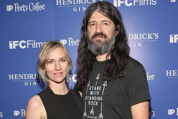 Mickey Sumner and Chris Kantrowitz on a red carpet in 2017.
