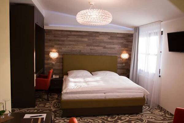 Postel nebo postele na pokoji v ubytování Hotel Freud