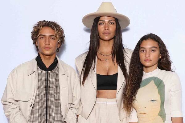 Camila Alves McConaughey (C) with son Levi Alves McConaughey (L) and daughter Vida Alves McConaughey (R) attend the Stella McCartney Womenswear Fall Winter 2023-2024 show as part of Paris Fashion Week on March 06, 2023 in Paris, France.