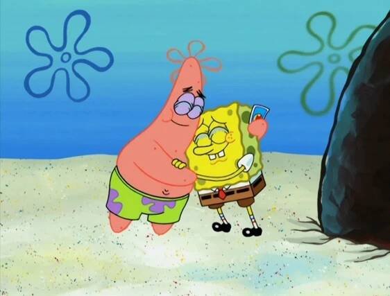 SpongeBob and Patrick hug happily under the sea, with SpongeBob holding a small card. Decorated sea floor visible