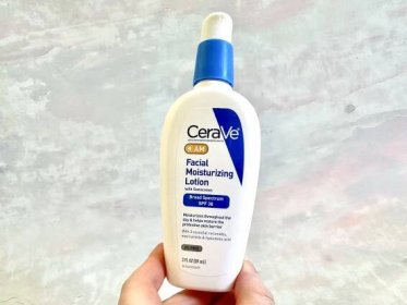 CeraVe AM Facial Moisturizing Lotion with Sunscreen, handheld.