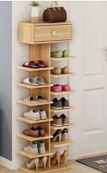 the shoe rack is made from wood and holds many pairs of shoes
