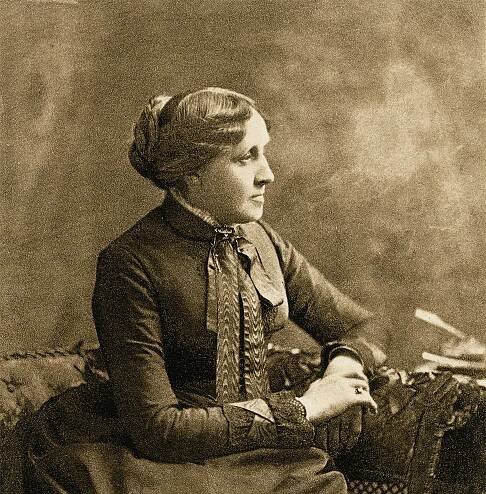 Novelist Louisa May Alcott sits in a photograph taken in the 1880s.