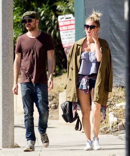 EXCLUSIVE: Aaron Paul heads to brunch on Malibu pier with his wife Lauren Parsekian, before taking a nap on the beach.