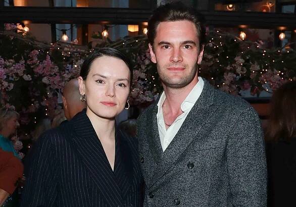 Daisy Ridley and Tom Bateman attend a Filmmaker's Dinner on May 11, 2023 in London, England.