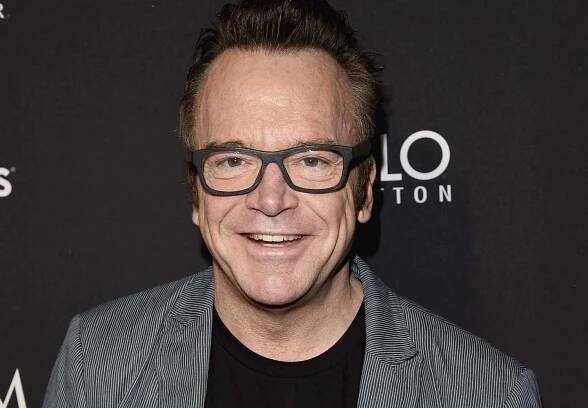 Tom Arnold Says Son Has Poster of 'True Lies' Costar Arnold Schwarzenegger in His Room (Exclusive)