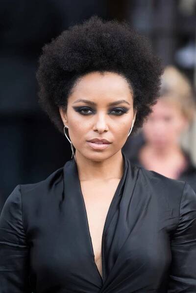 Kat Graham with an Afro curly pixie haircut