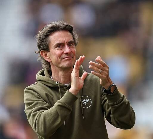 Brentford manager Thomas Frank applauding.
