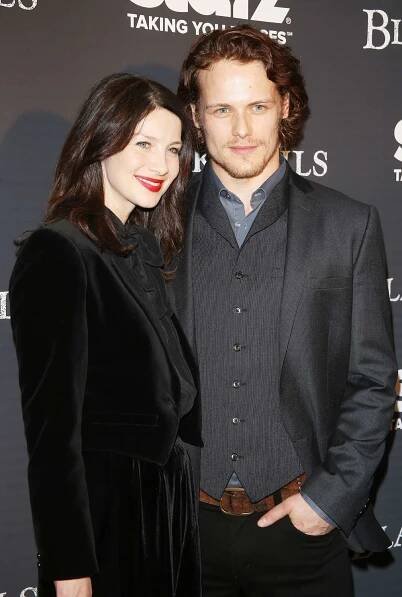 Caitriona Balfe (L) and Sam Heughan arrive at the Starz Original Series premiere of "Black Sails" held at the Harmony Gold Preview House and Theater on January 8, 2014 in Hollywood, California