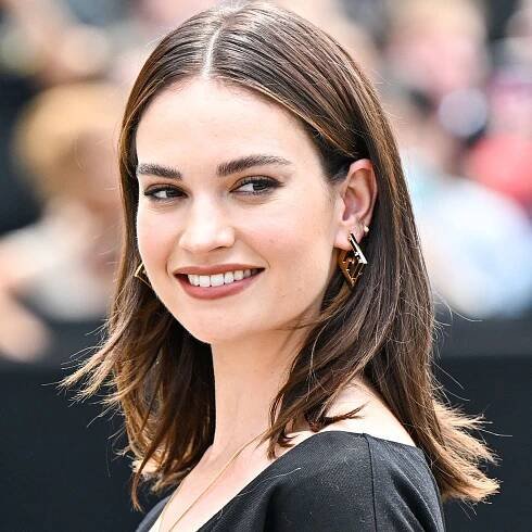 Lily James Welcomes Autumn With A Vino-Red Nail