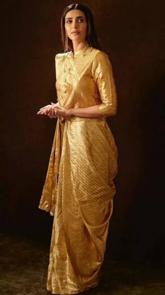 Karishma Tanna stuns in a breathtaking golden saree
