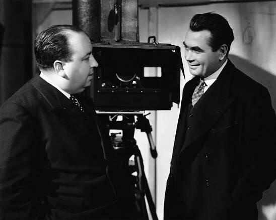 SABOTAGE, (aka A WOMAN ALONE), from left: director Alfred Hitchcock, Oskar Homolka on set, 1936