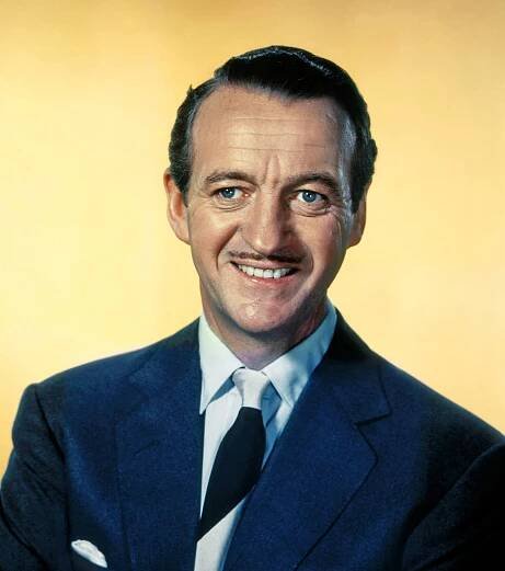 British actor and memorist, David Niven in a classic pose. Wallpaper