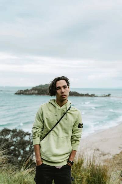 a person standing in front of a body of water
