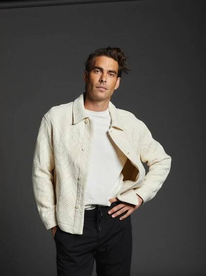 Image may contain Jon Kortajarena Blazer Clothing Coat Jacket Long Sleeve Sleeve Shirt Adult Person and Pants