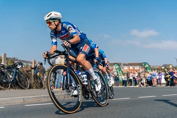 Pro cyclist’s horror three-metre plunge over guardrail sparks call for more earpieces, gear limits, protective kit, and other safety measures