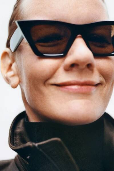 Image may contain Sandra Hüller Accessories Sunglasses Glasses Face Happy Head Person Smile Baby and Photography