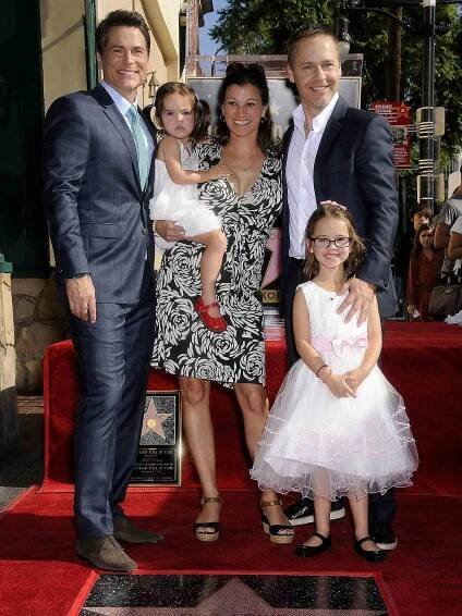 Rob Lowe, Fiona Hepler Lowe, Kim Painter, Mabel Painter Lowe, and Chad Lowe at the induction ceremony for Rob Lowe's Star on the Hollywood Walk of Fame in 2015.