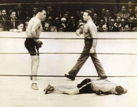 Italian Professional Boxer Primo Carnera Beside Ernie Schaaf Wallpaper