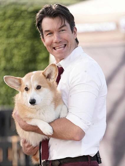 Actor Jerry O'Connell is seen holding a Corgi dog while on the set of EXTRA TV in Los Angeles.