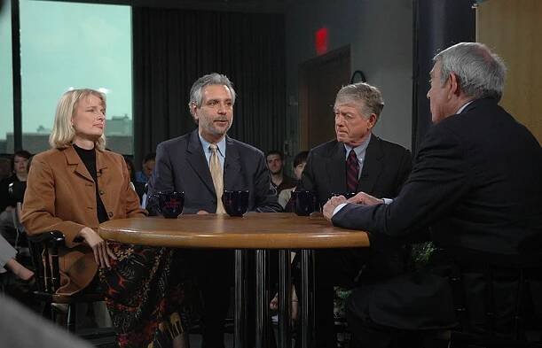 Diana Mutz, Michael Delli Carpini, Ted Koppel, and Dan Rather seated around a table talking
