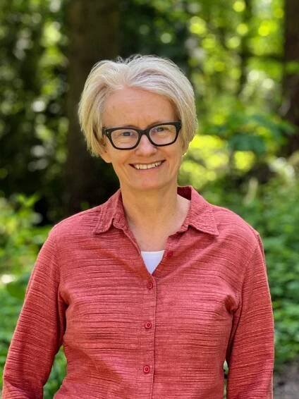Amy Stewart author photo in forest
