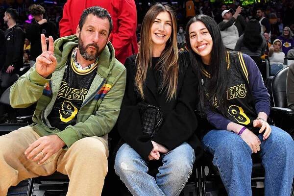 Adam Sandler Throws Up a Peace Sign and Smiles with Wife Jackie and Daughter Sadie at Los Angeles Lakers Game