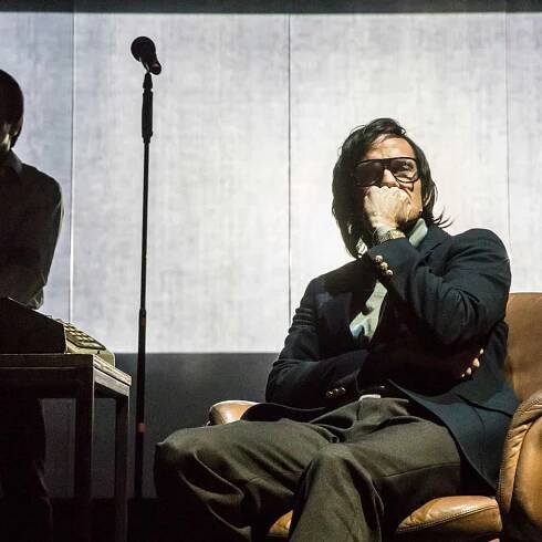 Ajay Naidu and Christian Camargo in The Kid Stays in the Picture directed by Simon McBurney. (Photo: Johan Persson)