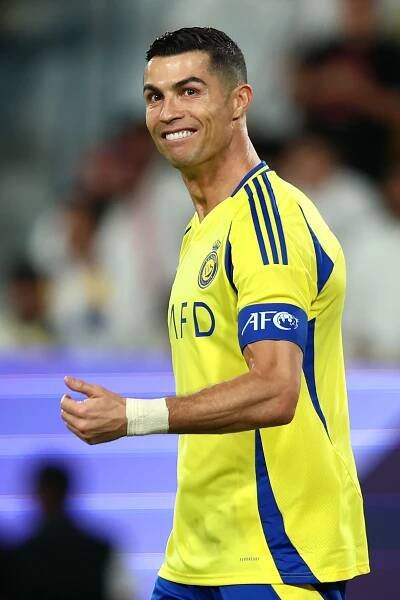 Cristiano Ronaldo of Al-Nassr reacting during a soccer match.