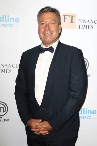 Man in tuxedo at an event.