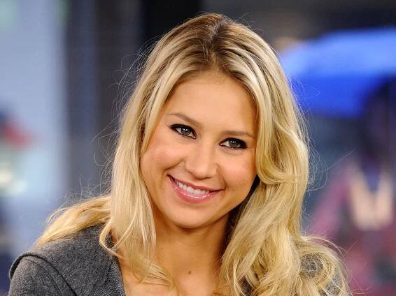 Anna Kournikova steps out with son as baby No. 4 is on the way