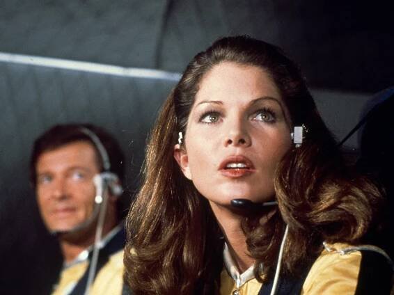Lois Chiles in a black and yellow costume