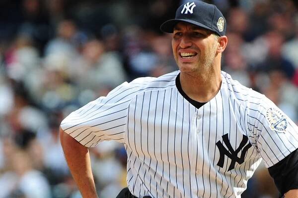 Yankees pitcher Andy Pettitte reacts during his team's loss to the Giants.