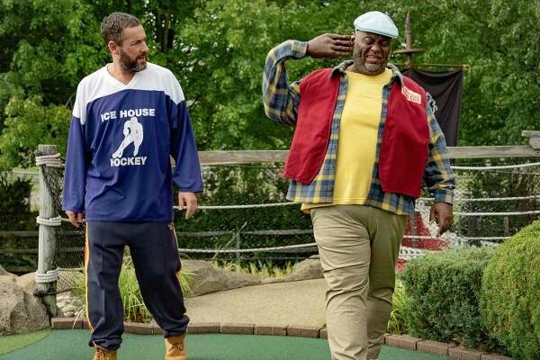 Adam Sandler as Happy Gilmore and Lavell Crawford as Slim Peterson in Happy Gilmore 2. 