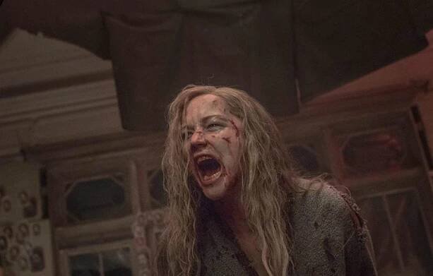 Jennifer Lawrence was disheveled in a torn sweatshirt with frizzy and bloodied hair in a still from the horror movie mother!