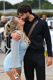 Love Island's Jess and Sammy snapped kissing as they return to UK with co-stars after win