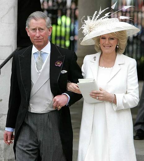 TRH Prince Charles, the Prince of Wales, and his wife Camilla, the Duchess of Cornwall, depart the Civil Ceremony where they were legally married, at The Guildhall, Windsor on April 9, 2005 in Berkshire, England
